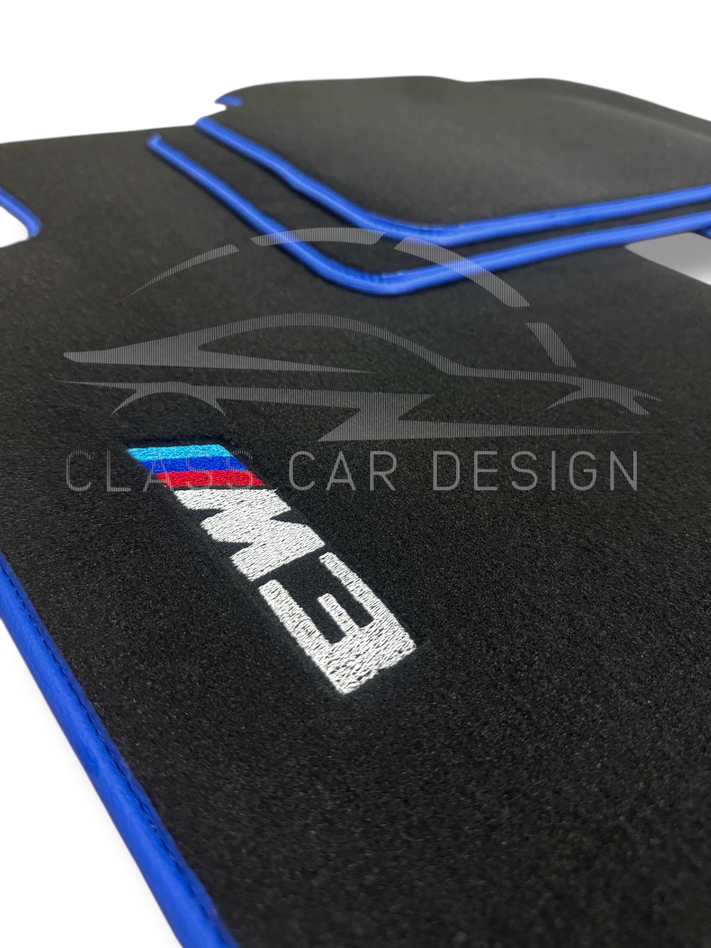 BMW M3 4-door E90 (2007-2013) Custom Fit Floor Mats M Blue Edging - Side View | Class Car Design